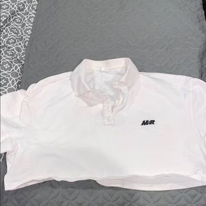 Cropped mistress rocks polo top